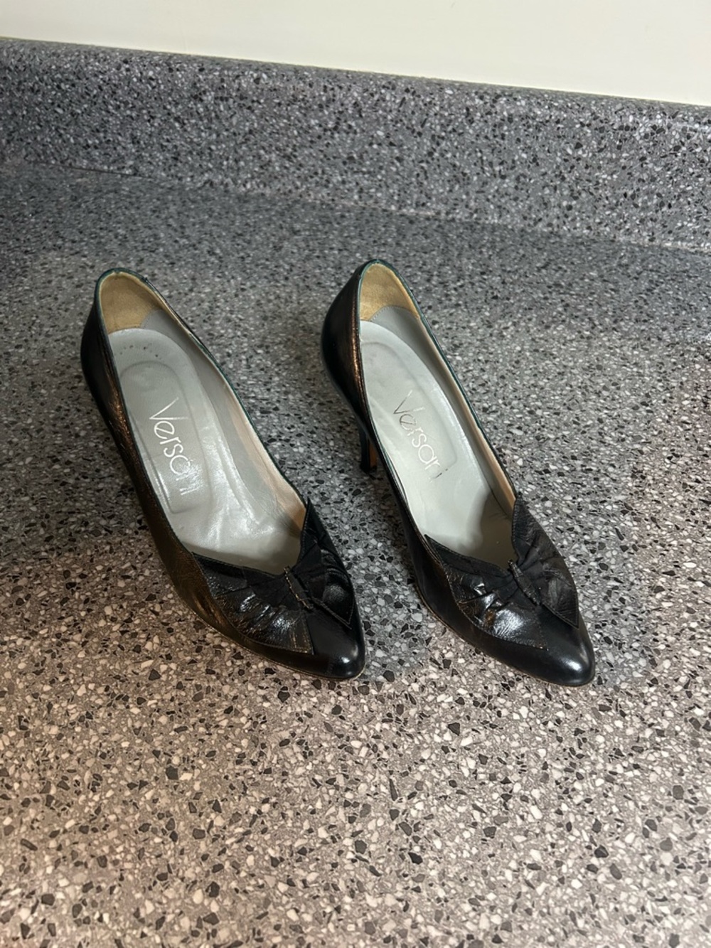 Versani Black Pointed-Toe Leather Heels with Decorative Knot